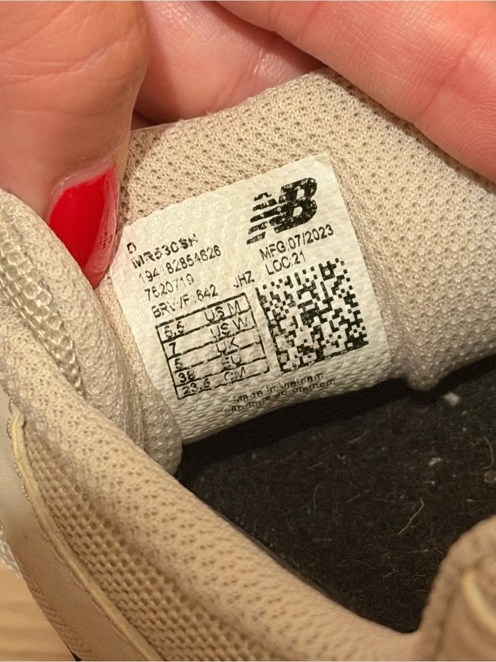 New Balance Cream Sneakers with Black Logo